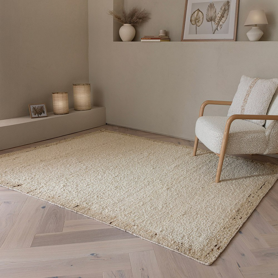 beige wool rug rug in a living room with matching dec