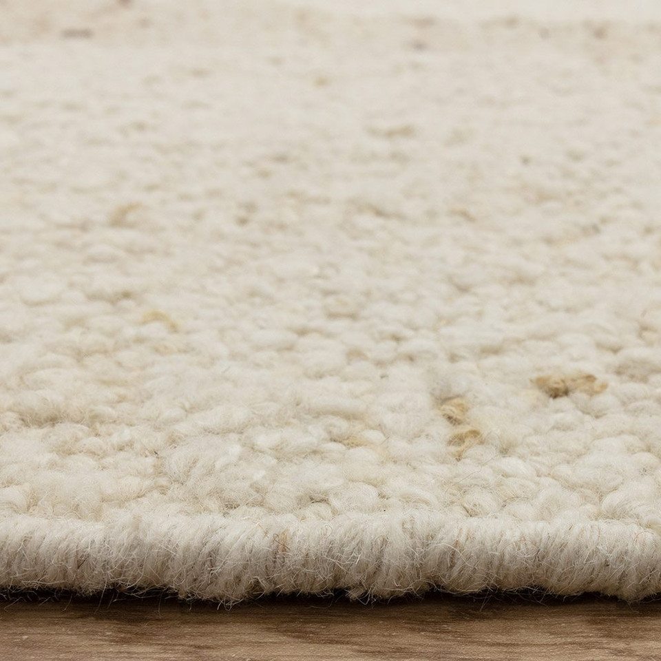 beige wool rug closeup border