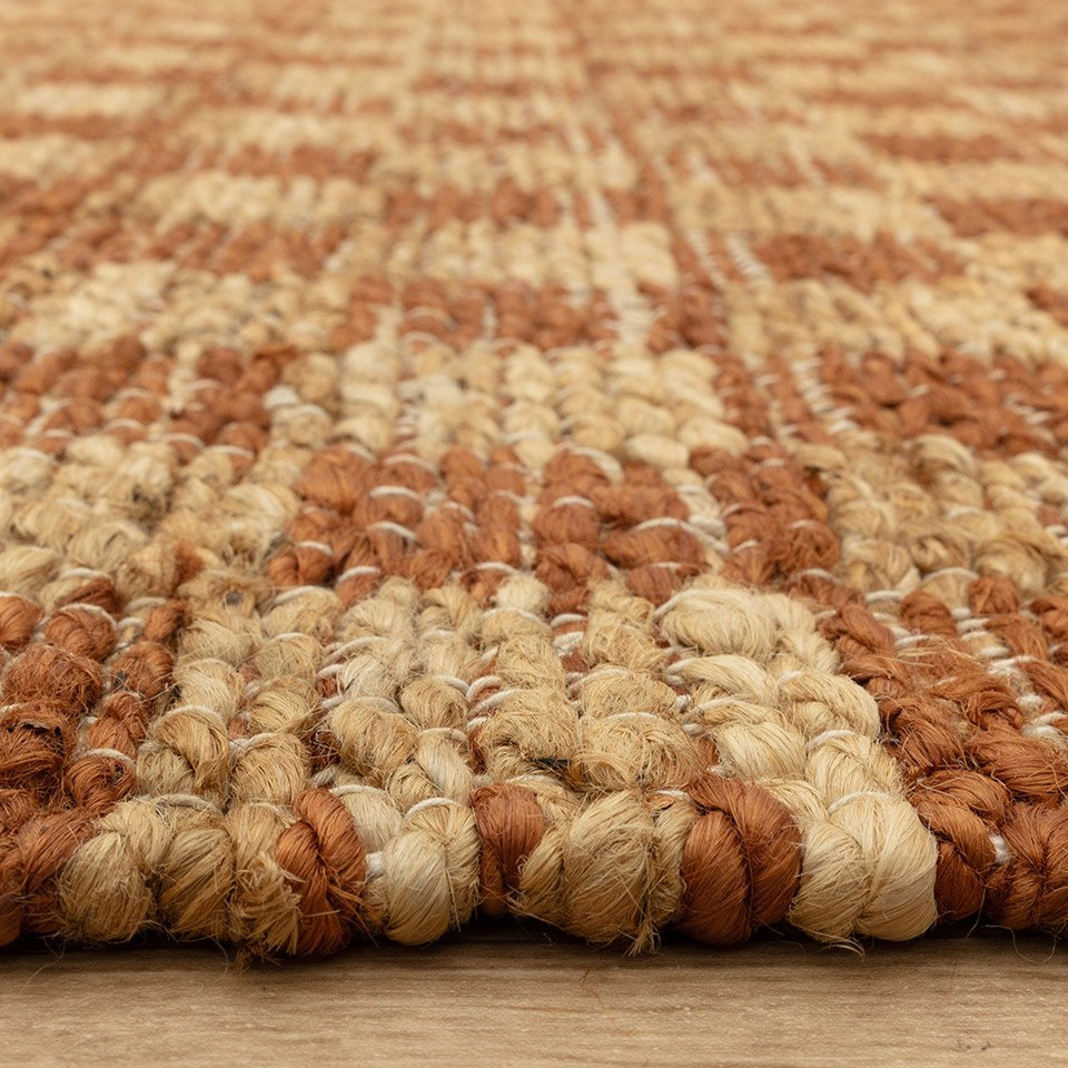 rust jute rug closeup border