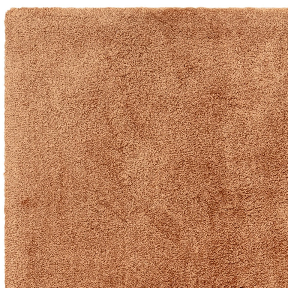 terracotta shaggy rug closeup corner