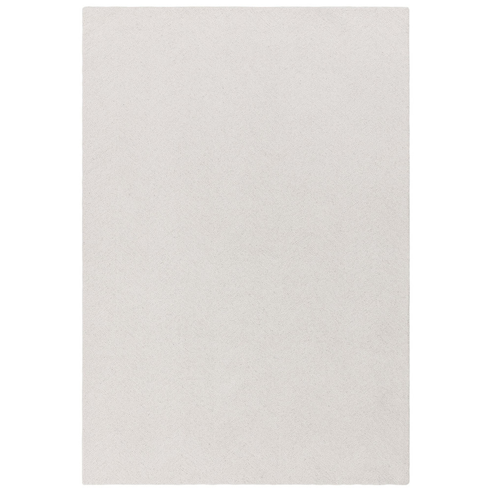 Full overhead product view of the rectangular Theodore wool rug, featuring an ivory cream base with a subtle, minimalist chevron pattern.