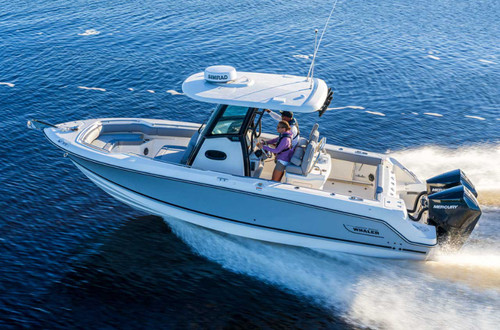 Boston Whaler 250 Outrage with Twin Mercury Outboards on the Water.