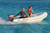 AB Lammina 12 AL Superlight Rigid Inflatable Boat with Yamaha outboard at sea.