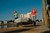 Achilles LEX 88 inflatable dinghy being carried by two young women.