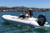 Zodiac Yachtline RIB hypalon with engine in action. Zodiac Yachtline RIB hypalon with engine in action.