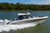 Boston Whaler 380 Realm with Quad Mercury Outboards on the Water.