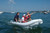 Achilles HB-280DX rigid hull inflatable boat with outboard.