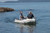 Achilles HB-270AX rigid hull inflatable boat with outboard.