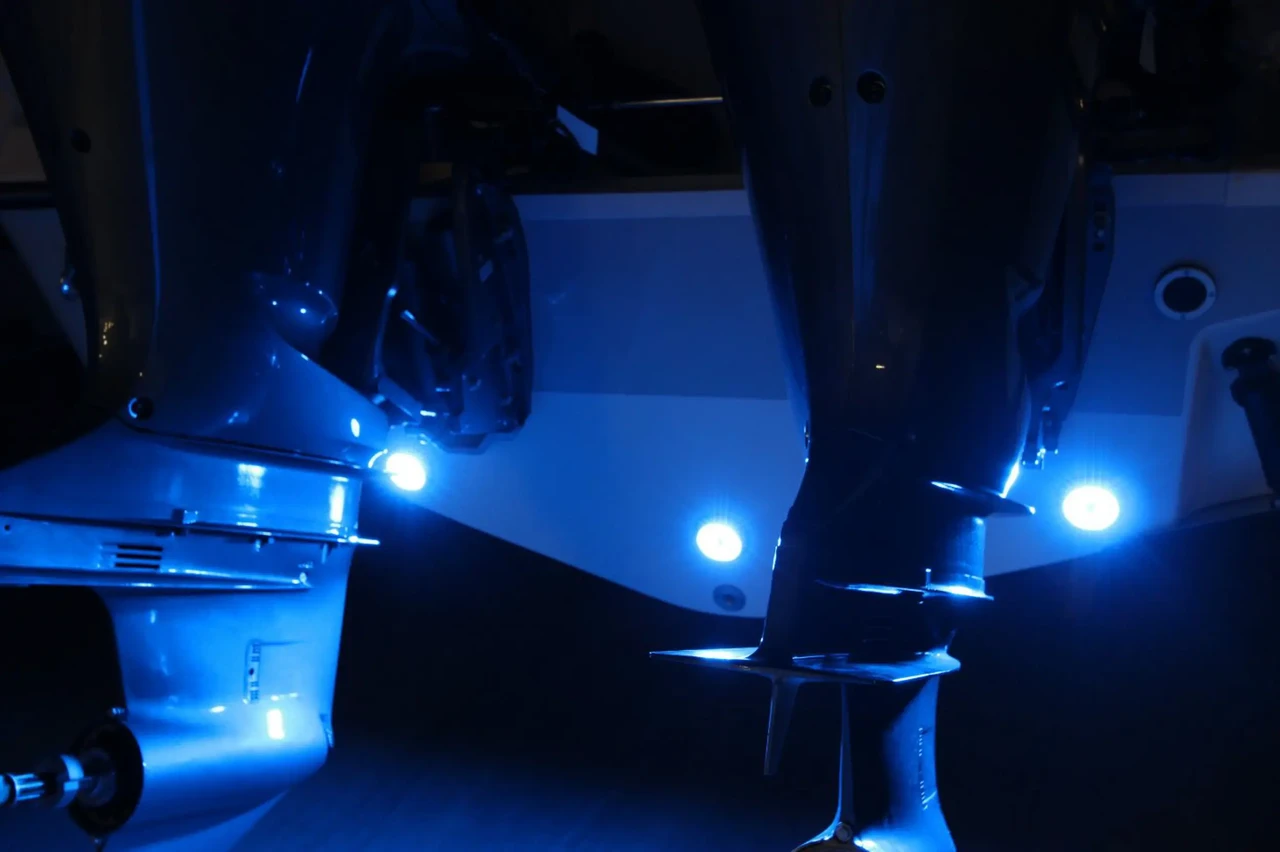 Underwater lights on a outboard boat motor.