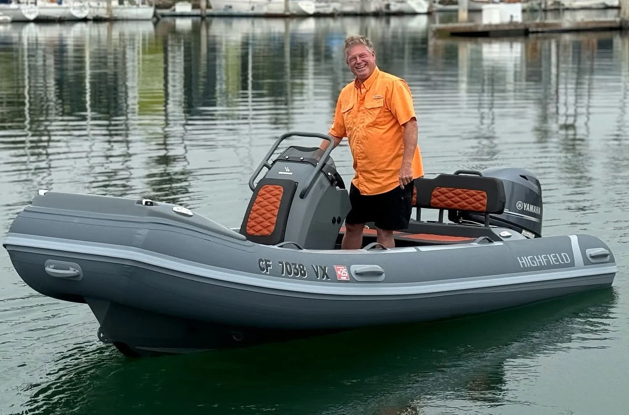 Happy customer on a Highfield Boat