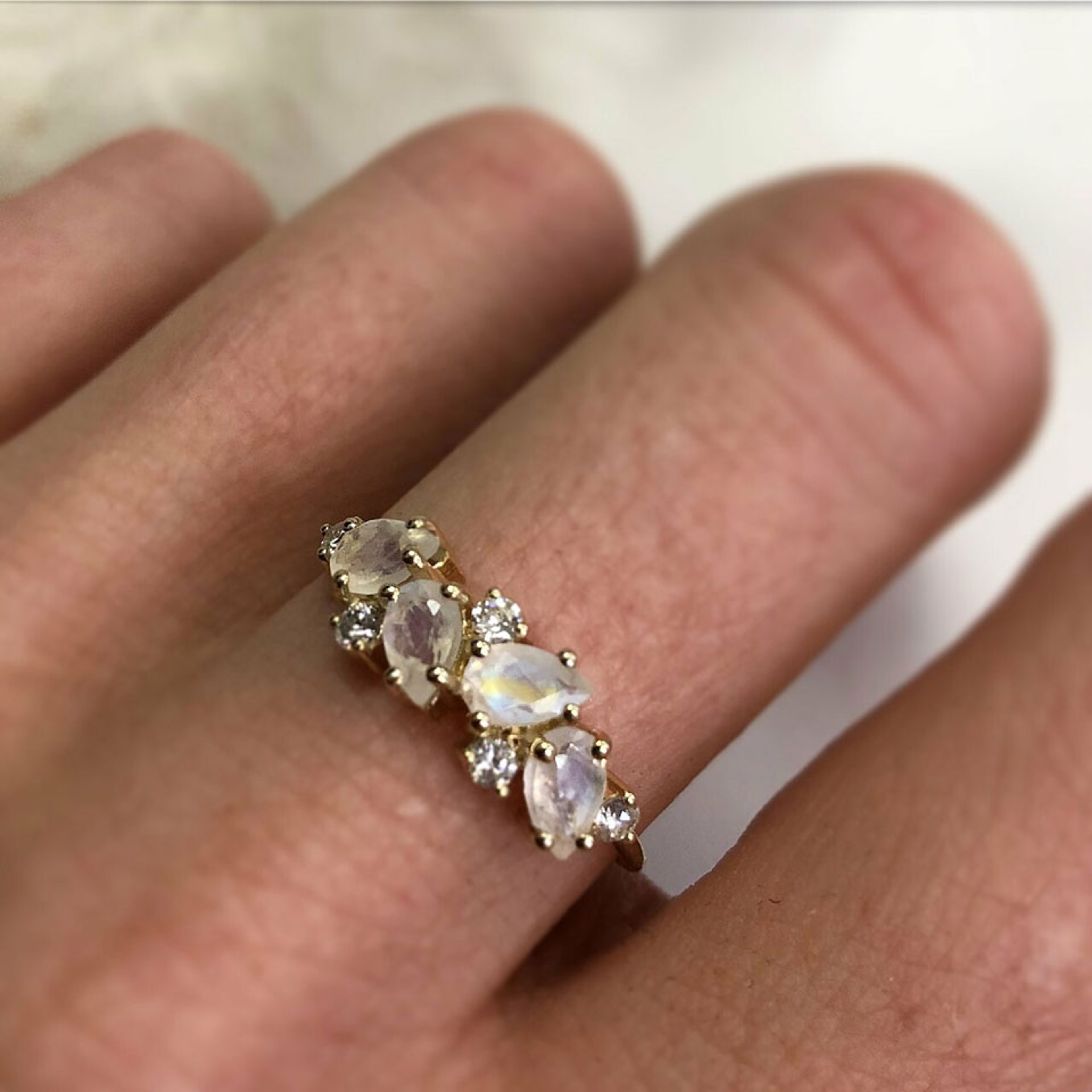 14K yellow gold cocktail ring with alternating moonstones and diamonds