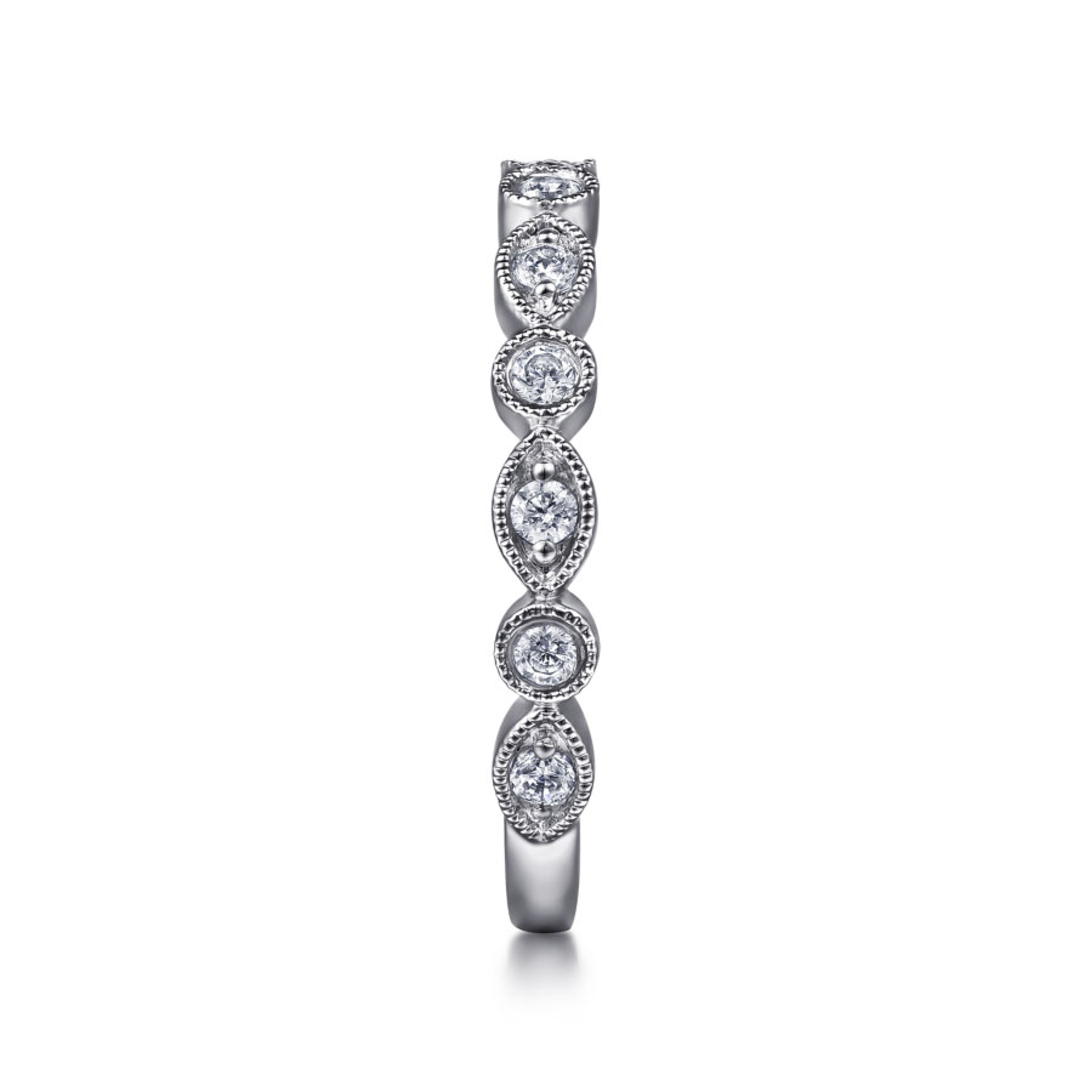 14K white gold diamond wedding ring with marquise and round shaped bezels and migrain detailing