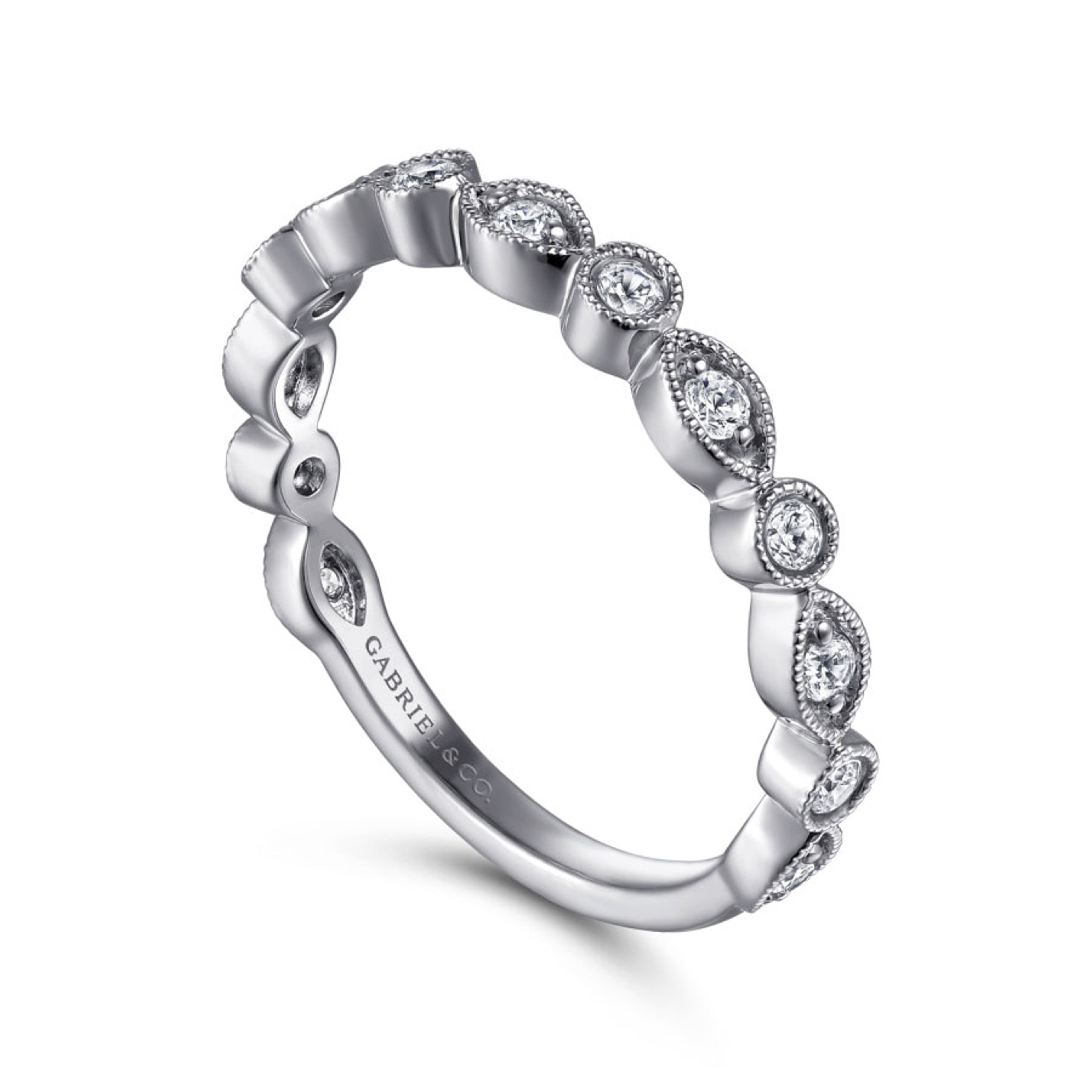 14K white gold diamond wedding ring with marquise and round shaped bezels and migrain detailing