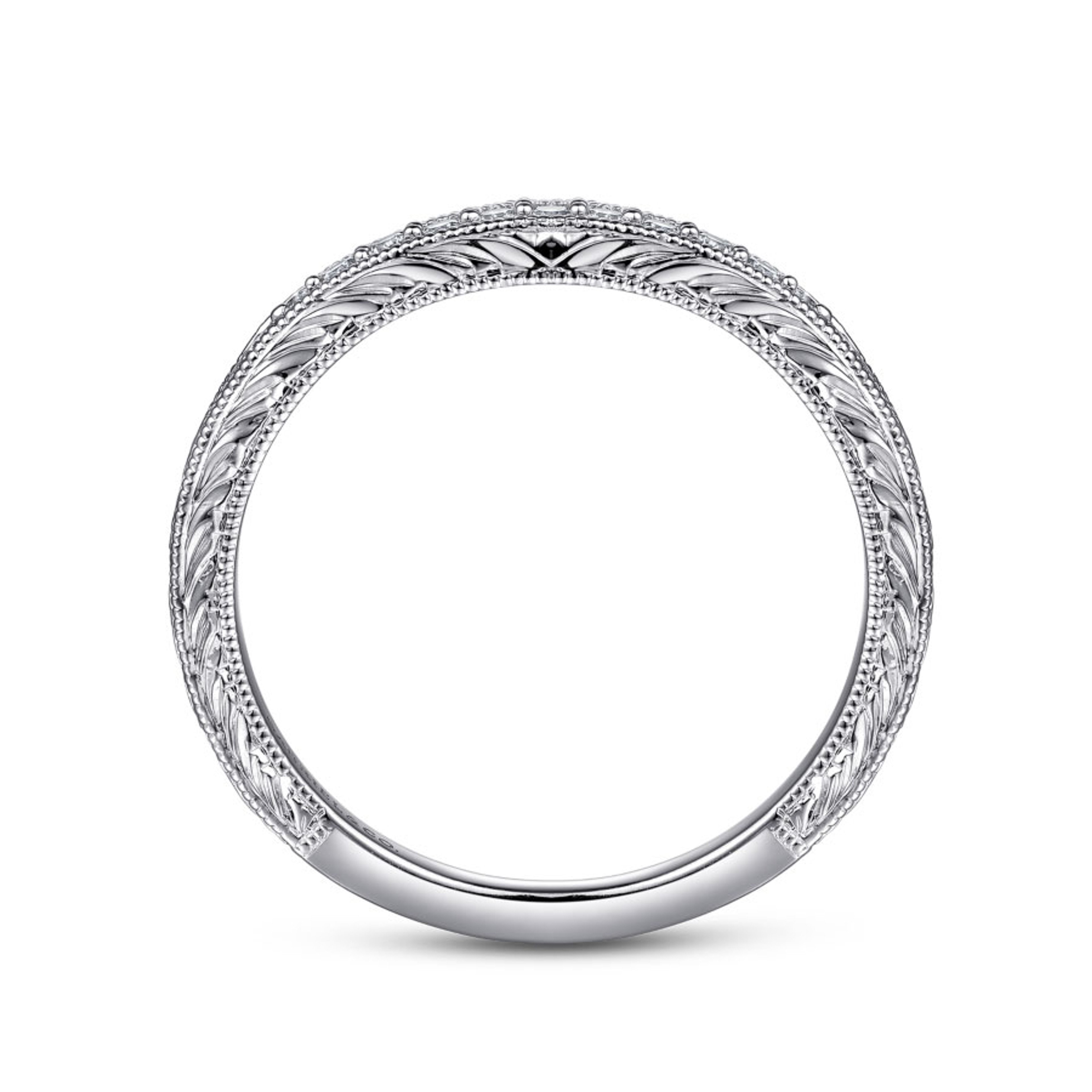 vintage-inspired wedding ring with channel set diamonds and milgrain detailing