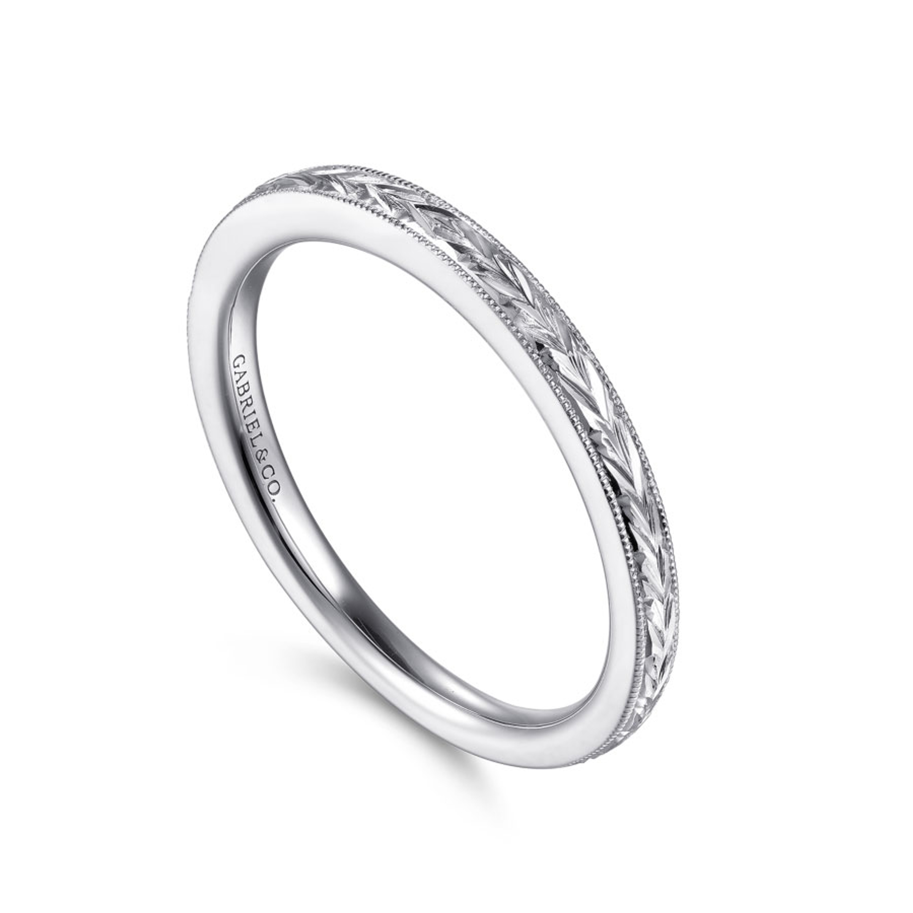 straight wedding ring with chevron pattern and milgrain detailing