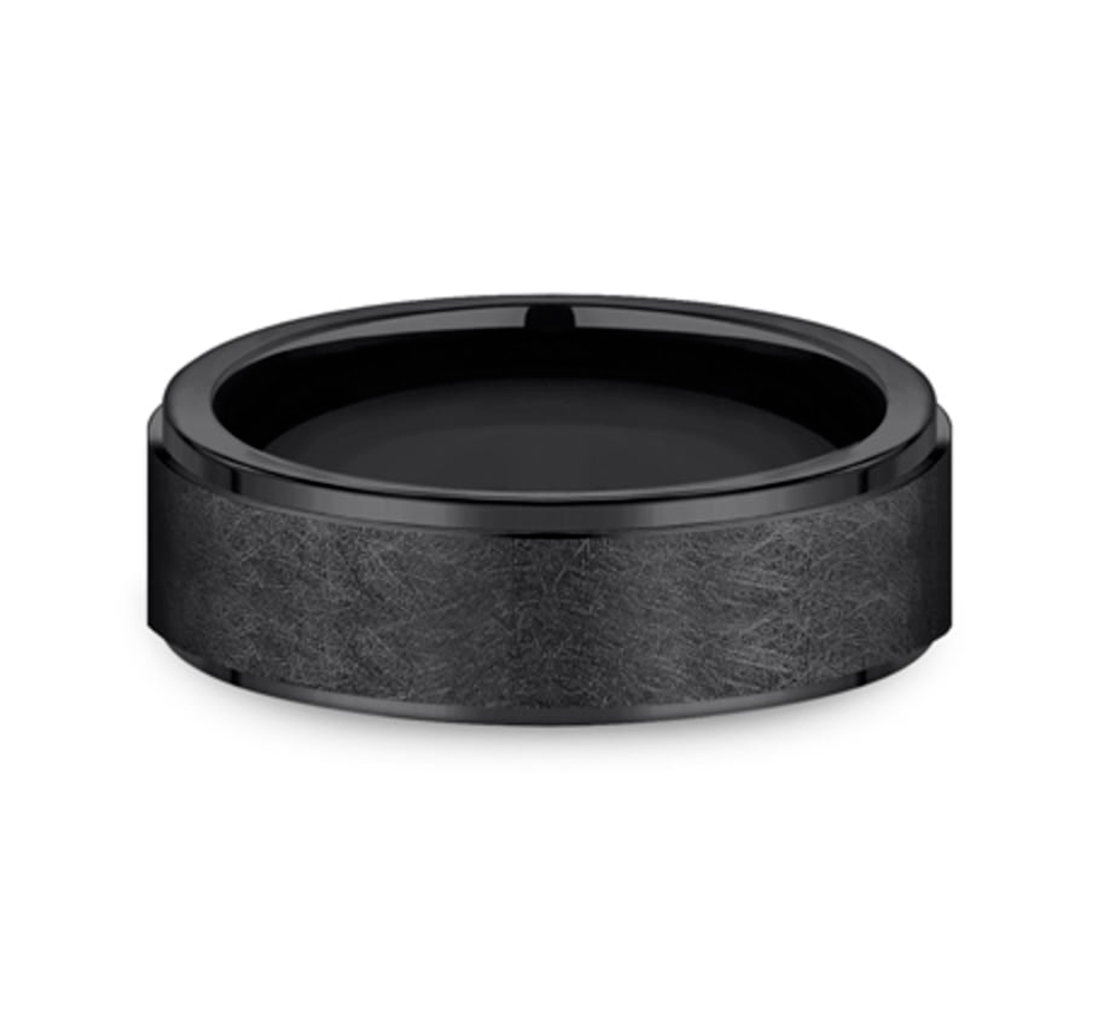 black titanium wedding ring with swirl finish and polished edges