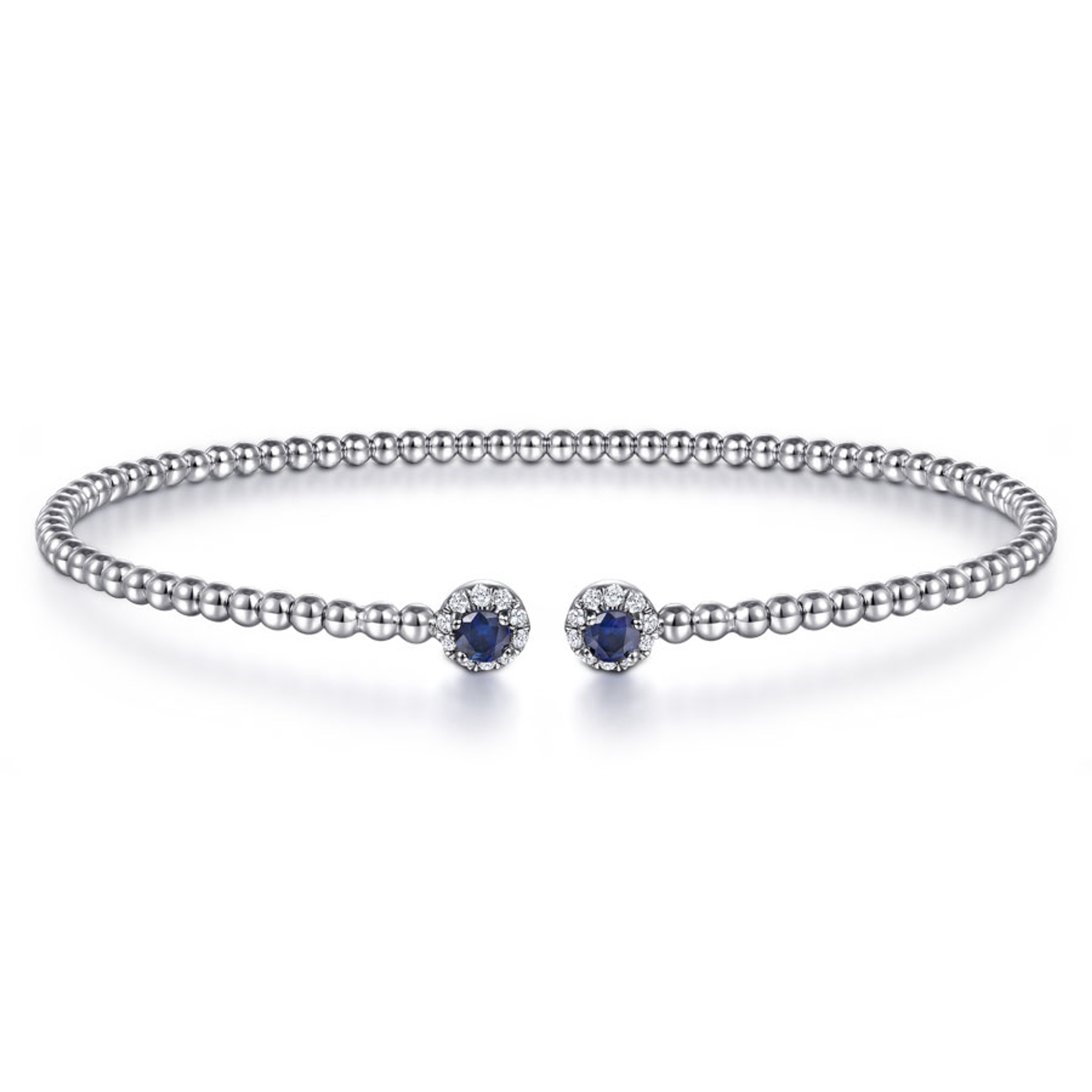 14K gold beaded bangle bracelet with blue sapphires surrounded by diamond halos
