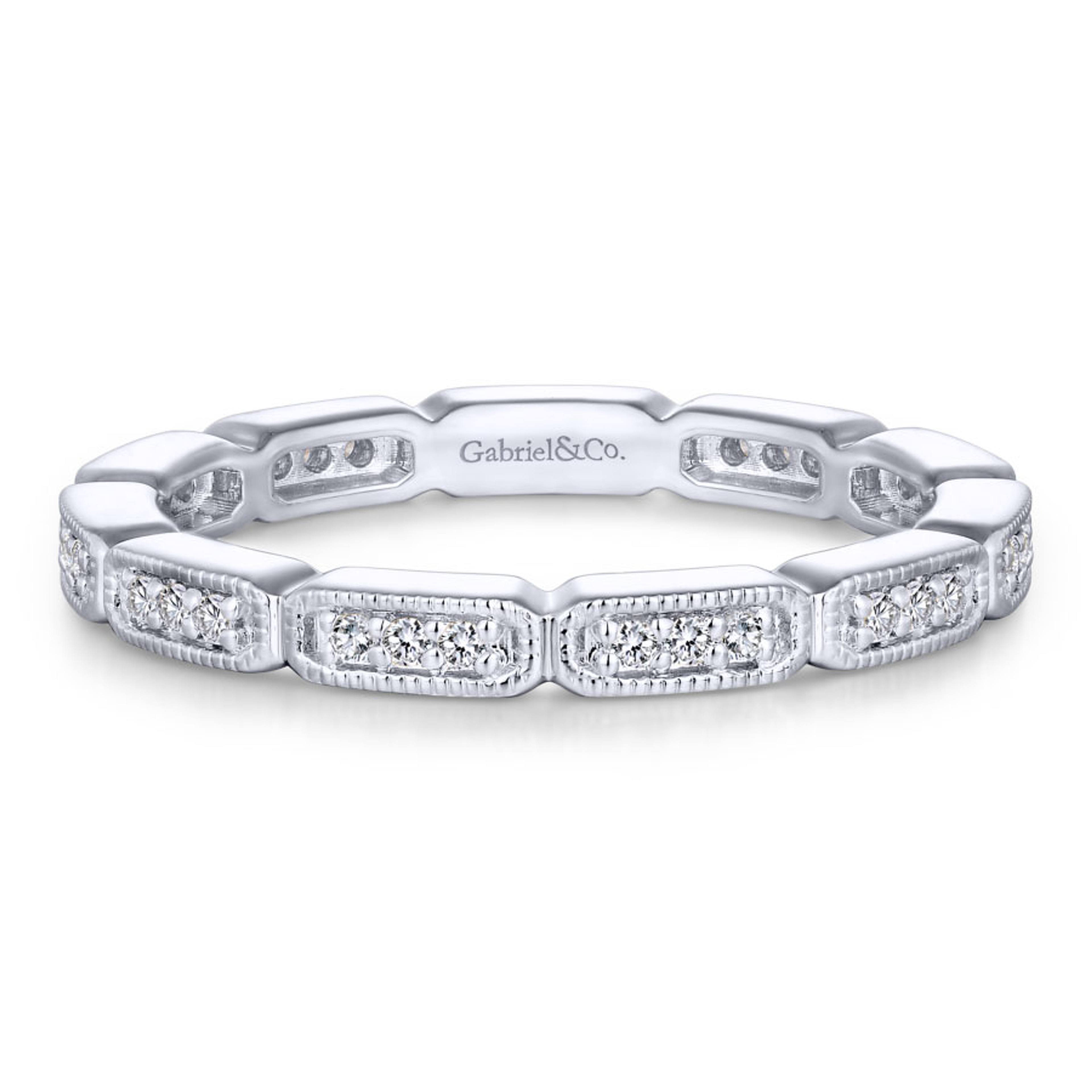 14K gold eternity ring with trios of diamonds in rectangular blocks