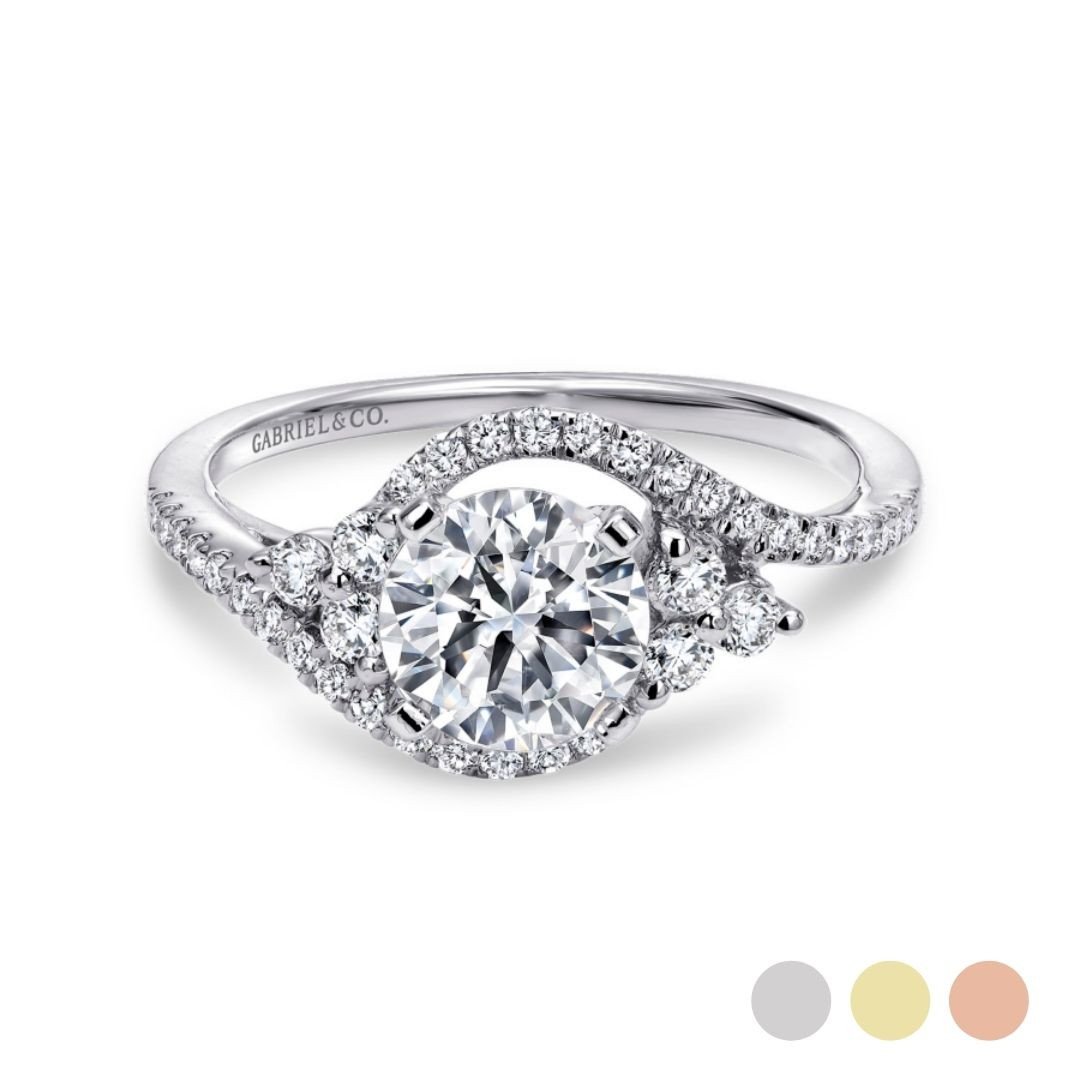 14K gold bypass engagement ring with diamond encrusted band that criss-crosses around the center stone and diamond accents