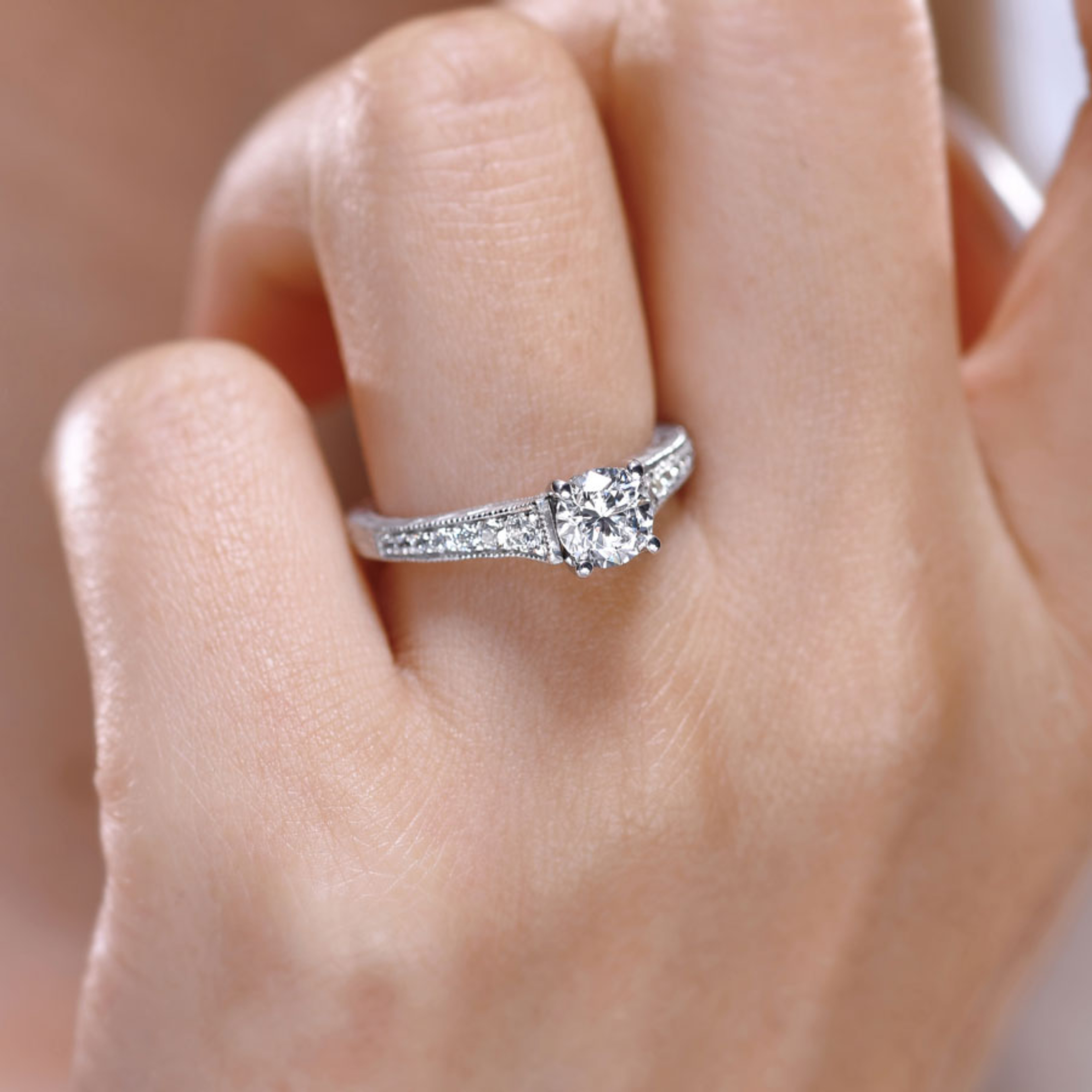 14K gold straight engagement ring with channel set diamond band