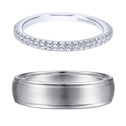 women's curved pave diamond wedding ring with matching men's polished wedding ring