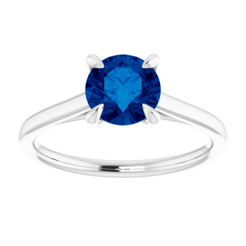 14K gold solitaire engagement ring with round sapphire center stone and polished band