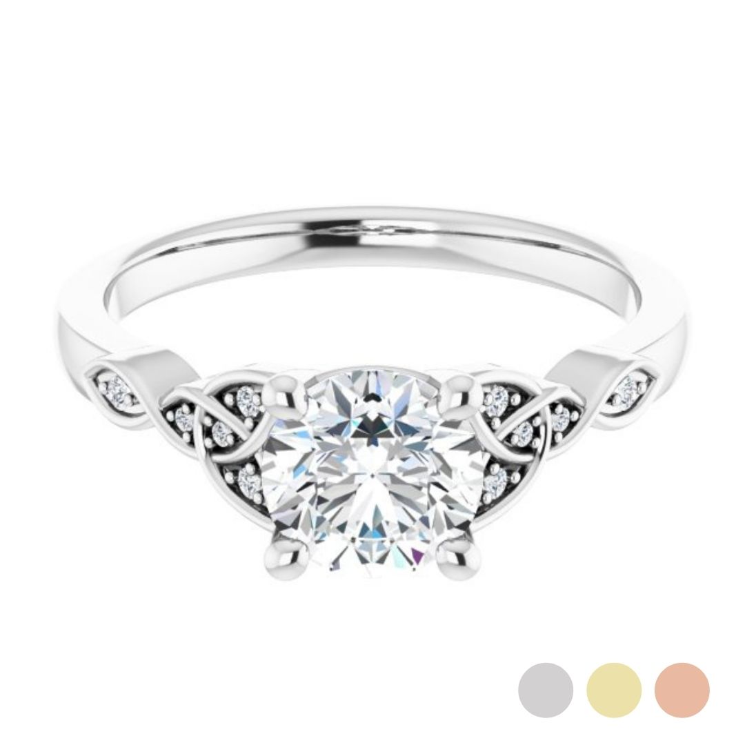 solitaire engagement ring with celtic-knot accents on each side of the center sotne