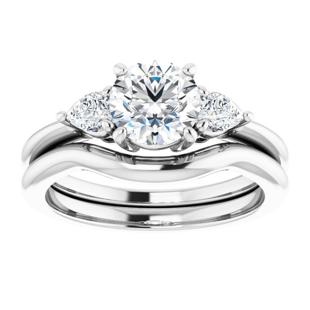 14K gold 3-stone engagement ring with pear-shaped accent diamonds and matching wedding ring