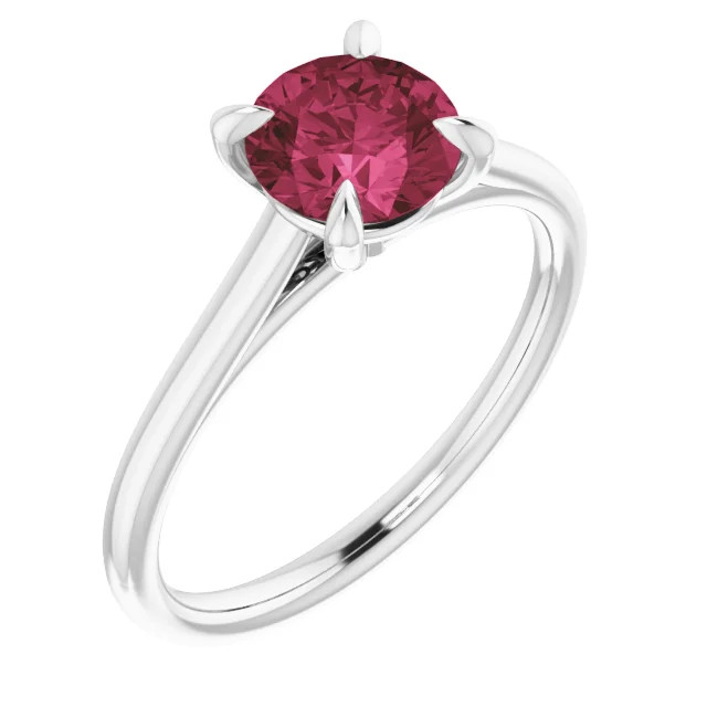 14K gold solitaire engagement ring with round garnet center stone and polished band