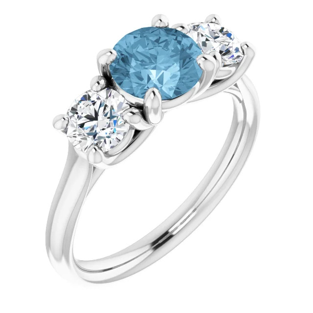 14K gold three stone engagement ring with round blue topaz center stone and diamond side stones with a polished band