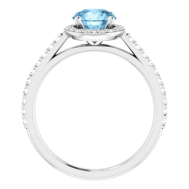 14K gold halo engagement ring with round blue topaz center stone and lab grown diamond halo and accented band