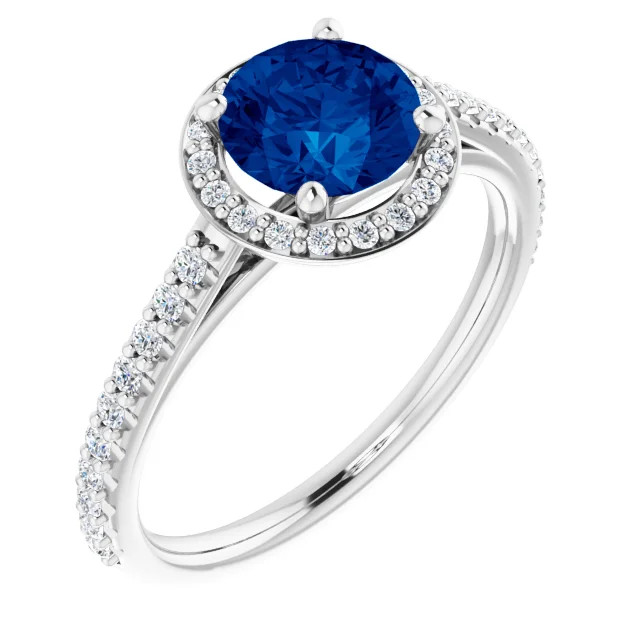 14K gold halo engagement ring with round lab grown blue sapphire center stone and lab grown diamond halo with lab grown diamond accented band