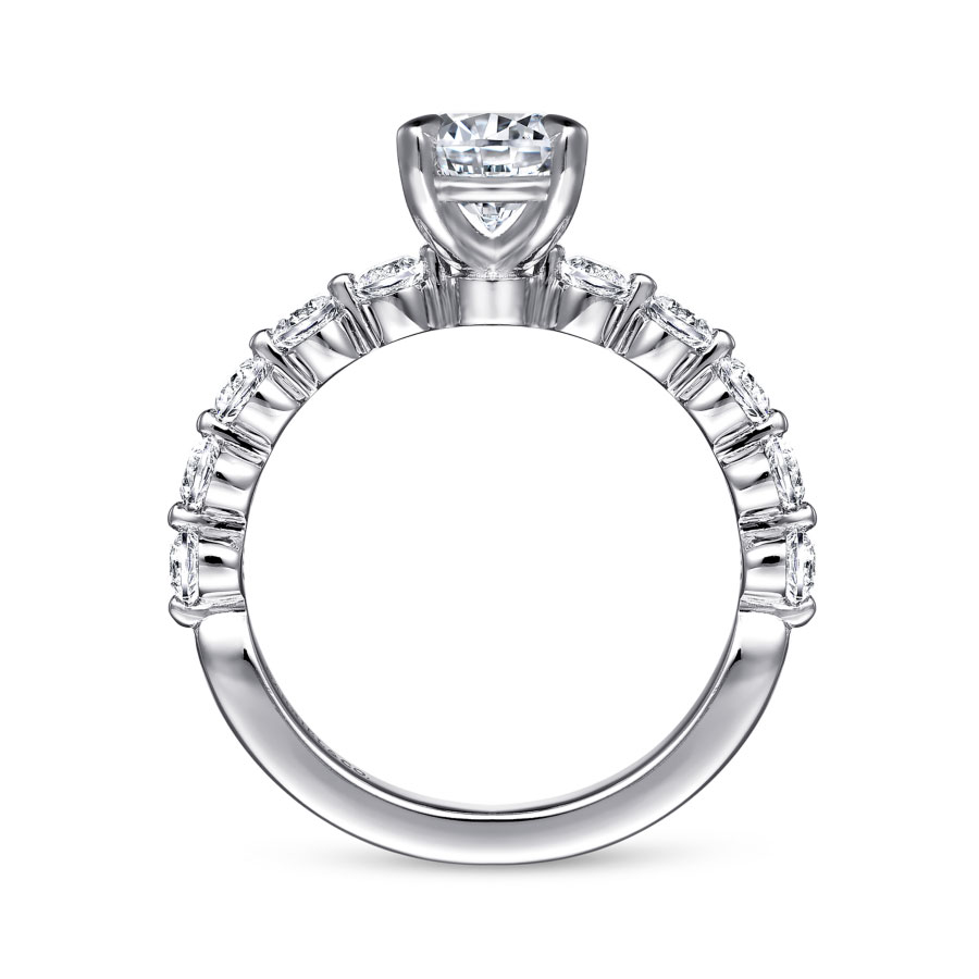 straight engagement ring with round moissanite center stone and polished band with semi-bezel set natural diamond accent stones