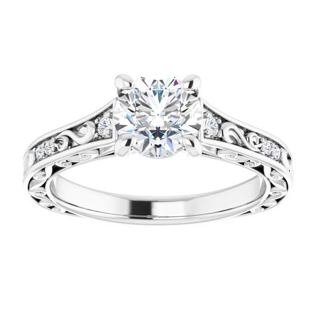 vintage-inspired engagement ring with scrollwork and diamond accents in the band