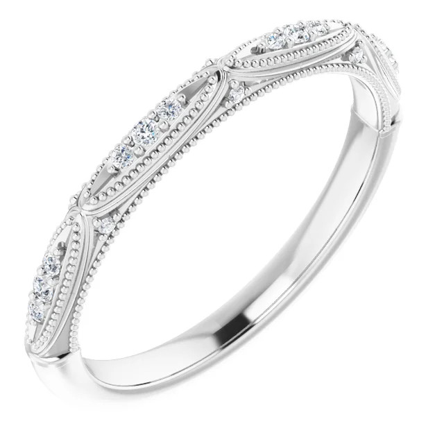 vintage-inspired wedding ring with diamond accents and milgrain detailing