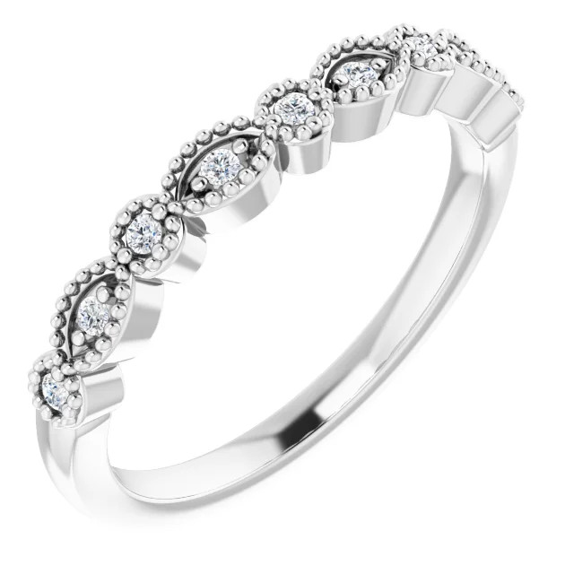 straight wedding ring with milgrain detailing and diamonds