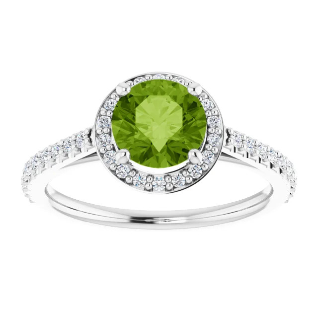 14K gold halo engagement ring with round peridot center stone and lab grown diamond halo with lab grown diamond accented band