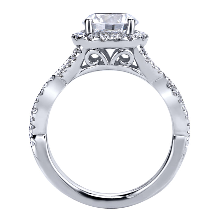 halo engagement ring with round moissanite center stone and criss-cross band with pave diamonds