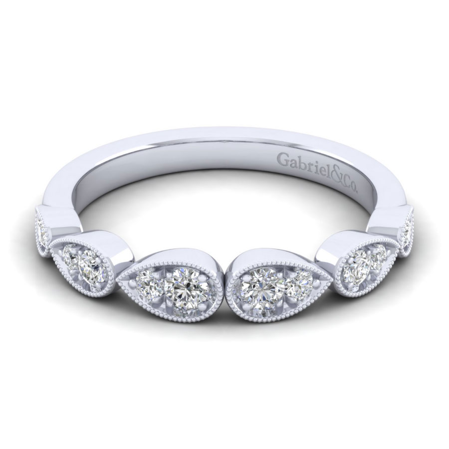 vintage-inspired diamond wedding ring with pear-shaped milgrain detailing