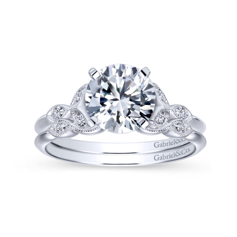 vintage-inspired pave diamond wedding ring with milgrain detailing