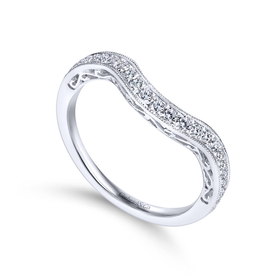 curved channel-set diamond wedding ring with ornate scrollwork