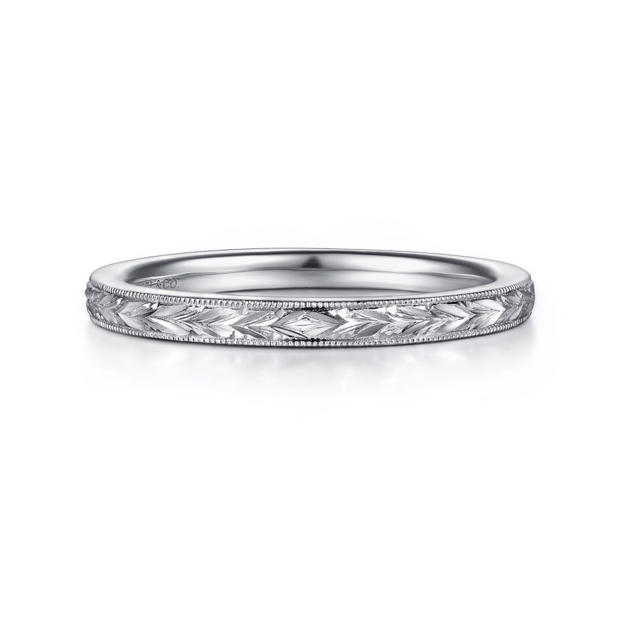 straight wedding ring with chevron pattern and milgrain detailing