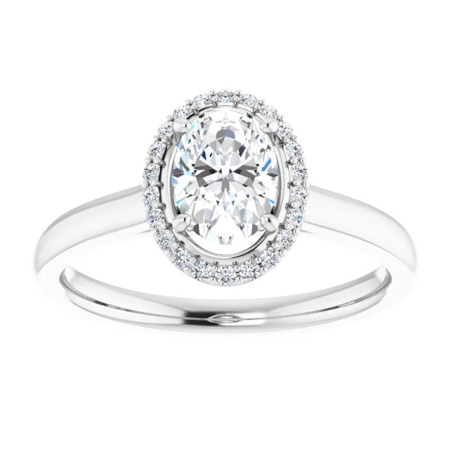 halo engagement ring with oval shaped moissanite center stone and natural diamond accented halo with a polished band
