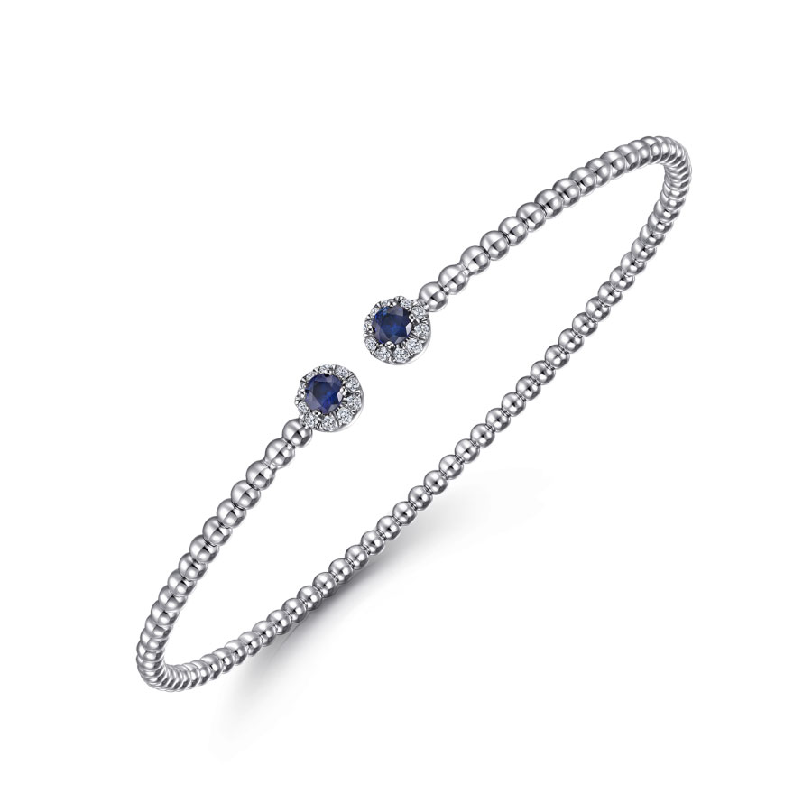 14K gold beaded bangle bracelet with blue sapphires surrounded by diamond halos