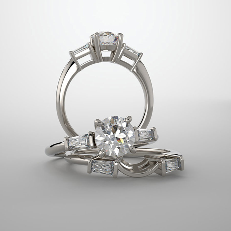 three stone engagement ring with tapered baguette diamond accent stones