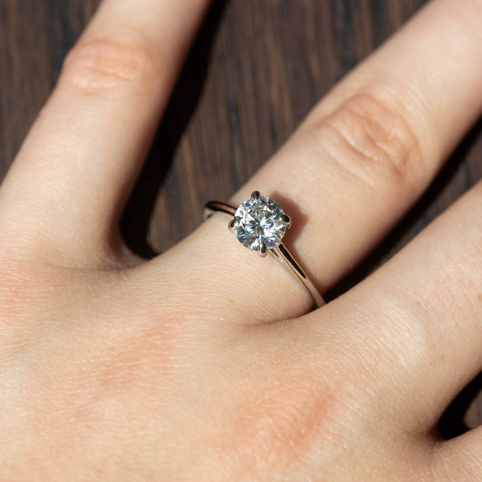cathedral-style solitaire engagement ring