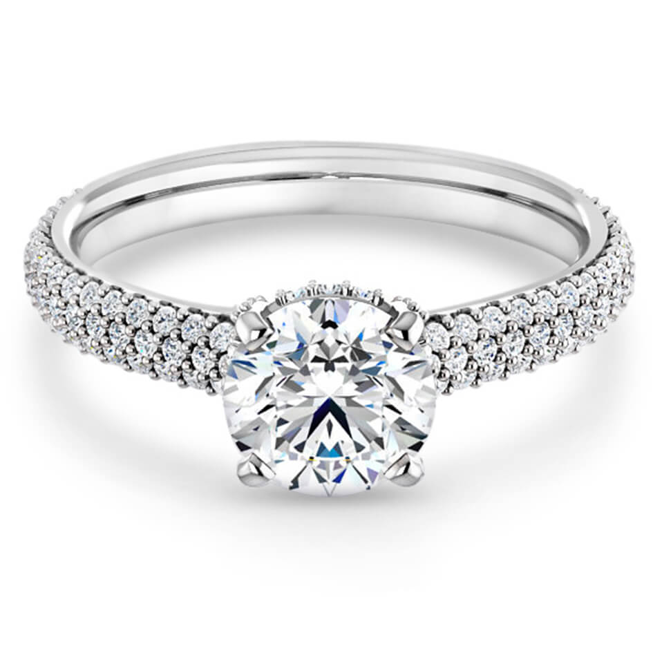 straight engagement ring with 3 rows of micropave diamonds and a hidden halo of diamonds on a diamond accented band