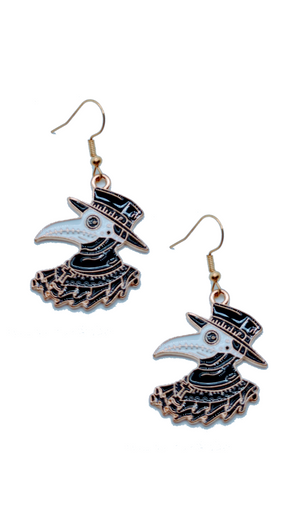 A curated set of Mystic Charm earrings featuring intricate, gothic-inspired designs with enamel detailing and gold-tone hooks. Styled across a mix of clean product shots and moody, aesthetic backgrounds, this collection blends dark elegance with a mystical edge. Each piece showcases unique character and craftsmanship, perfect for adding a bold, alternative statement to any look.