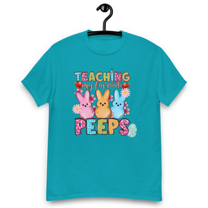 This Easter, show your love for your students and celebrate the season in style with the "Teaching My Favorite Peeps" Unisex Classic Tee. A perfect blend of comfort, style, and festive spirit, this tee is a must-have for any educator's wardrobe.