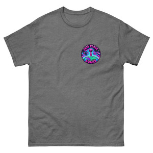 Unisex t-shirt displayed flat showing a bright alien graphic printed small on the front pocket and large on the back. Neon-style, colorful design with bold “This Place Sucks” lettering.